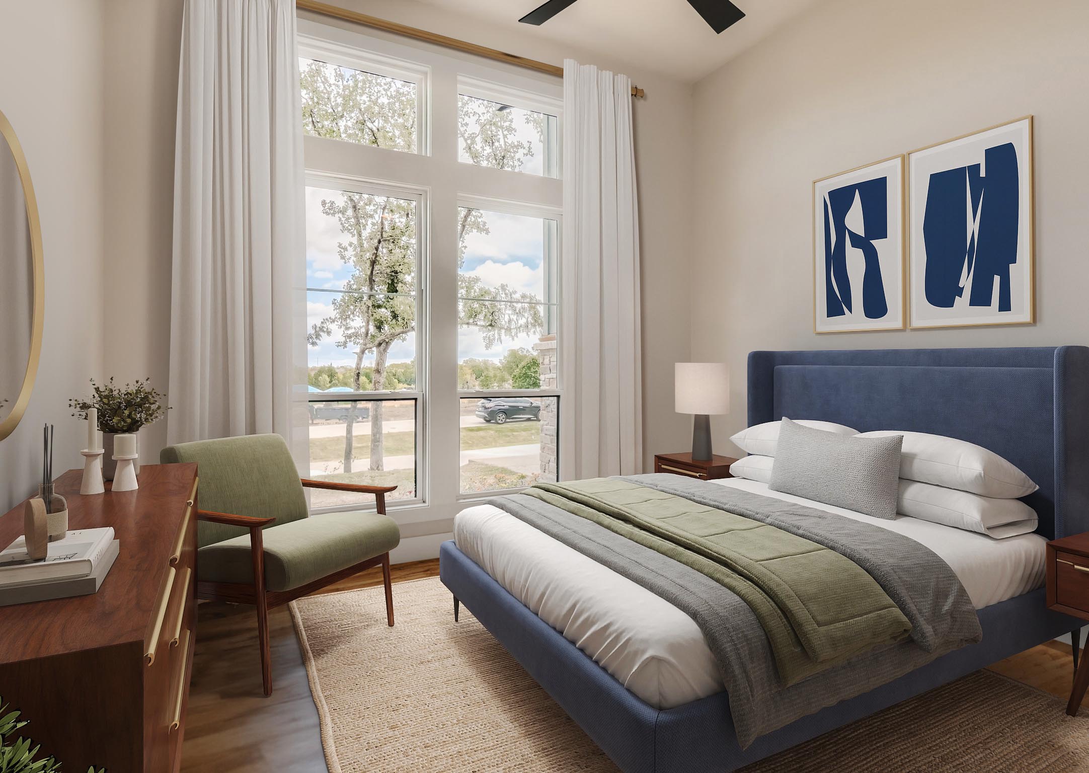 Bright mid-century modern bedroom design featuring a navy blue upholstered bed frame, a sage green accent chair, and abstract wall art next to large windows by Virtual HomeZen.