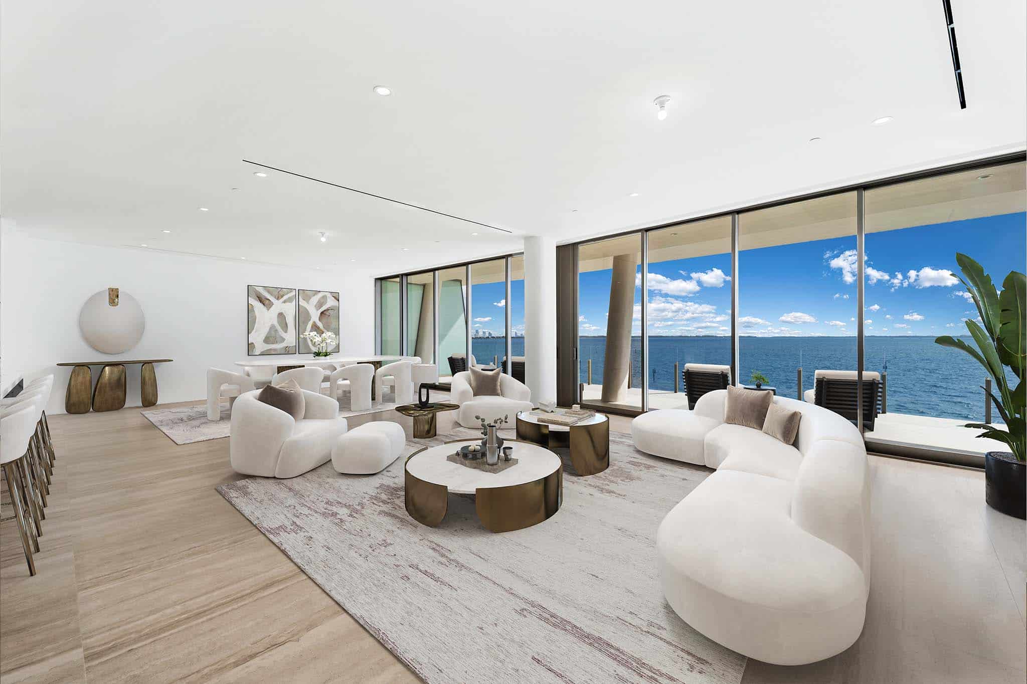 High-end virtual staging of a neutral luxury living room featuring modern furniture and designer accents for real estate marketing.