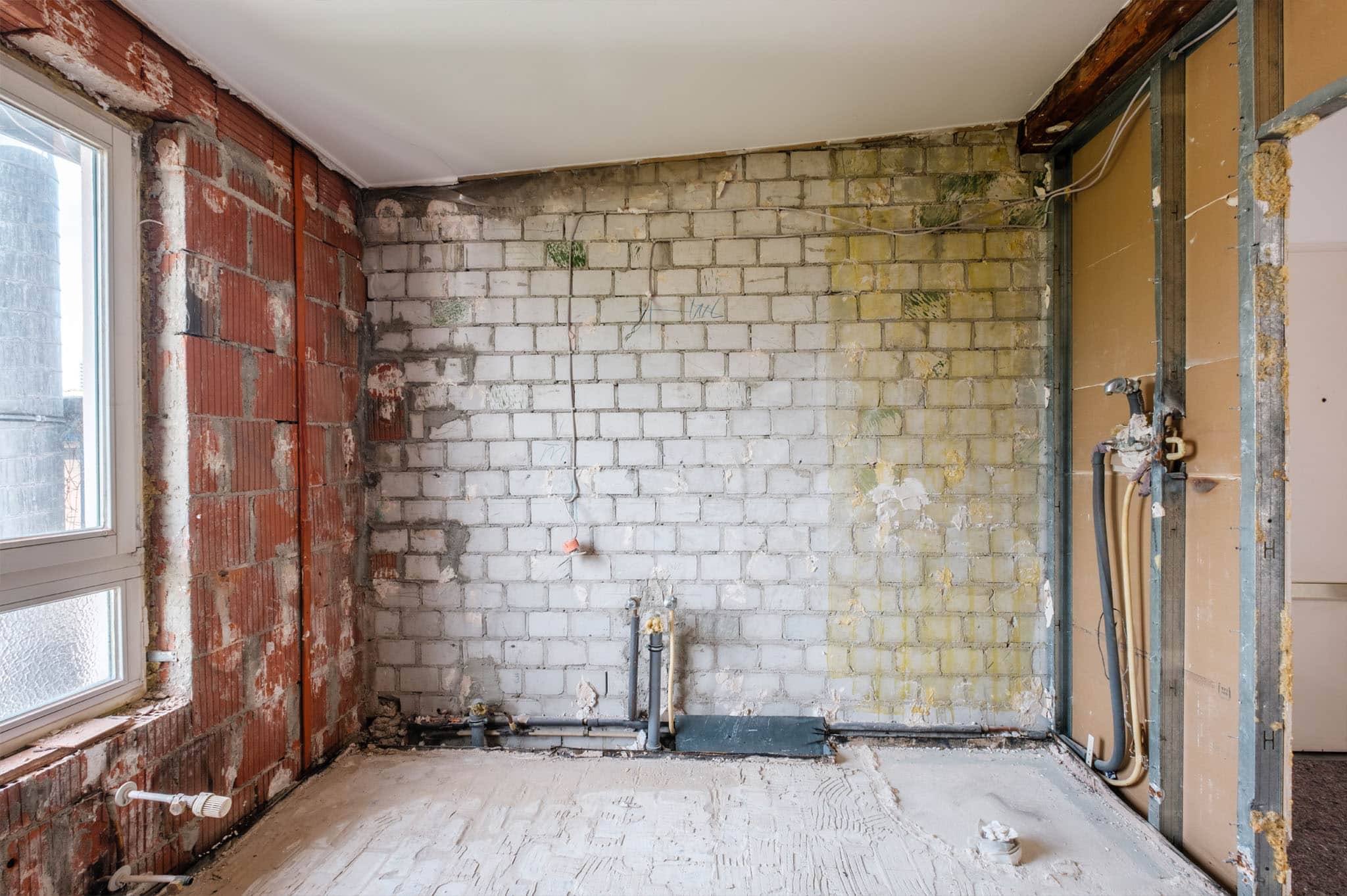 Outdated bathroom before virtual renovation, with original tile and fixtures